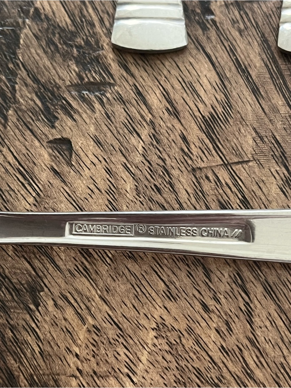Cambridge Silver Codie Flatware: Glossy Stainless Steel Dinner Forks (7) - Picture 3 of 6